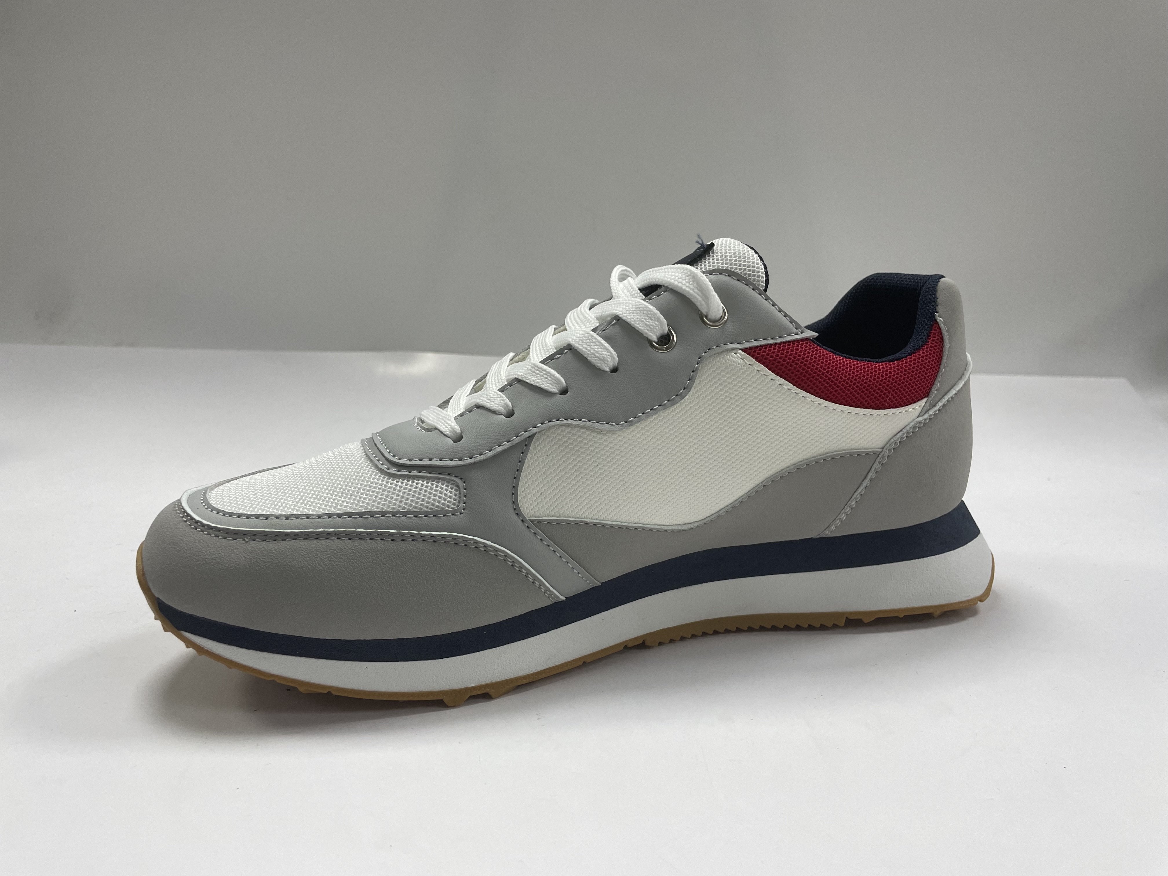 Hot Selling Low Price PU Trendy Men Casual Shoes Manufacturer Custom Logo Fashion Skateboard Shoes for Men